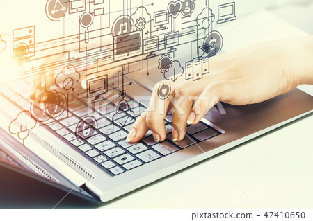 Woman typing on keyboard 47410650