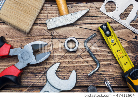 Set of different repair tools on wooden background 47411604