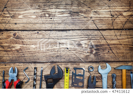Set of different repair tools on wooden background 47411612
