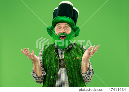 A man in a leprechaun hat at studio. He celebrates St. Patrick's Day. A man in a leprechaun hat at studio. He celebrates St. Patrick's Day. 47411684