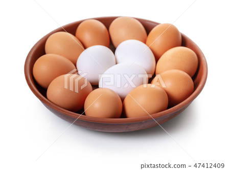 chicken eggs in bowl 47412409
