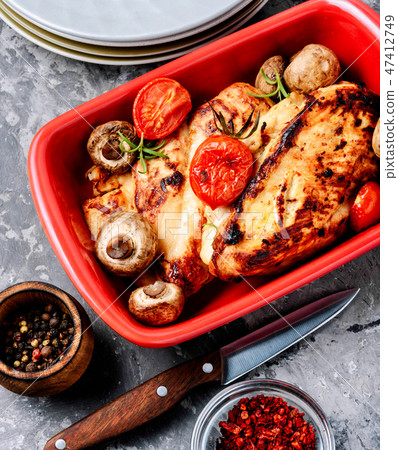 Baked chicken with mushrooms 47412749