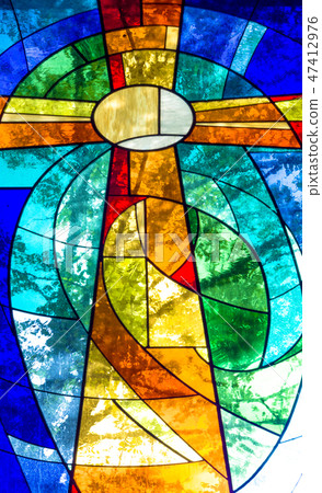 Stained glass cross in bright vivid colors 47412976