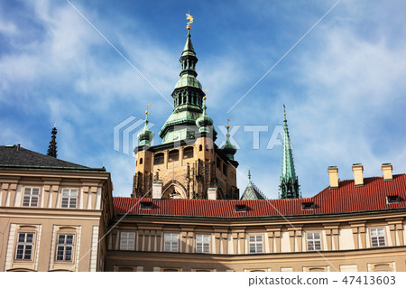 St. Vitus Cathedral spire and blue sky 47413603
