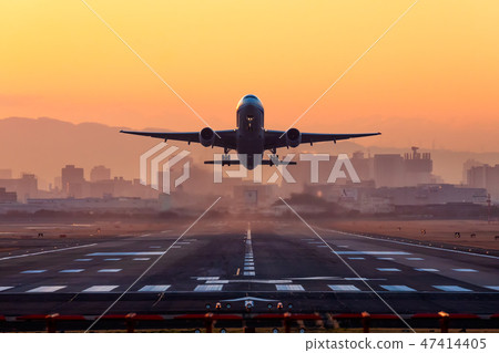 Itami Airport Triple Seven to take off in the morning light 47414405