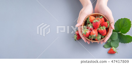 Grass melon water fruit winter indigo tree bowl female hand background strawberry strawberry strawberries 47417809