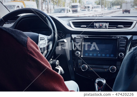 A fragment of the interior of a modern car. 47420226