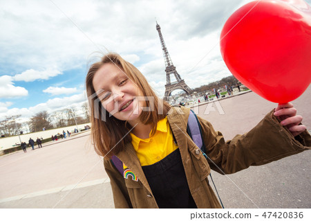 girl on the background of the Eiffel Tower girl on the background of the Eiffel Tower 47420836