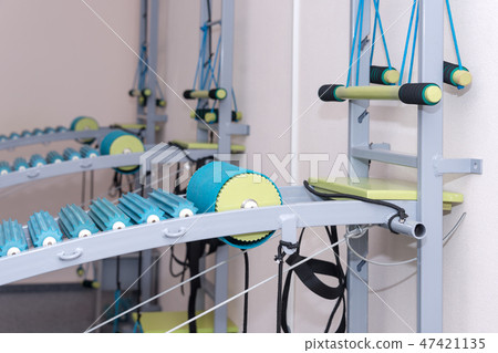 Medical spine trainer equipment. Spinal cord injury rehabilitation equipment in modern clinic Medical spine trainer equipment. Spinal cord injury rehabilitation equipment in modern clinic 47421135