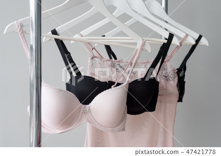 Vareity of bra hanging on a hanger. Textile, Underwear. Female bra in lingerie underwear store 47421778