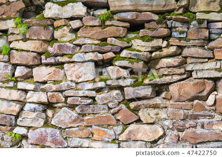 old wall masonry of different sizes with moss old wall masonry of different sizes with moss 47422750