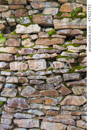 old wall masonry of different sizes with moss old wall masonry of different sizes with moss 47422751