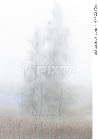 misted glass with a few drops of water 47422758