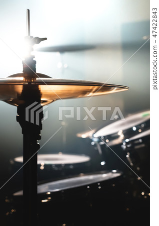 Close-up Drum set in a dark room against the backdrop of the spotlight. Atmospheric background Close-up Drum set in a dark room against the backdrop of the spotlight. Atmospheric background 47422843