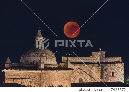 The red blood moon over the Caceres old town The red blood moon over the Caceres old town 47422872