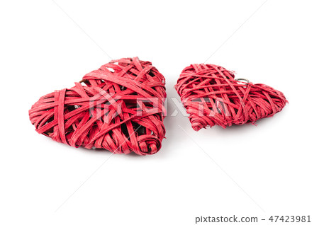 Two red hearts made of straw, isolated on white 47423981