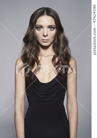 Fashion photo of beautiful lady in black dress. 47424390