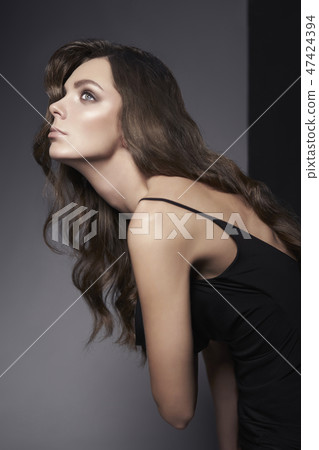 Fashion photo of beautiful lady in black dress. 47424394