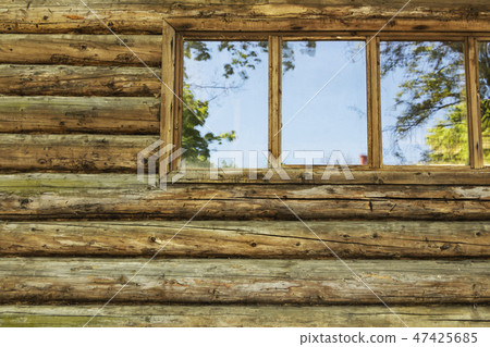 Wooden log wall and window of the farmhouse ideal Wooden log wall and window of the farmhouse ideal 47425685