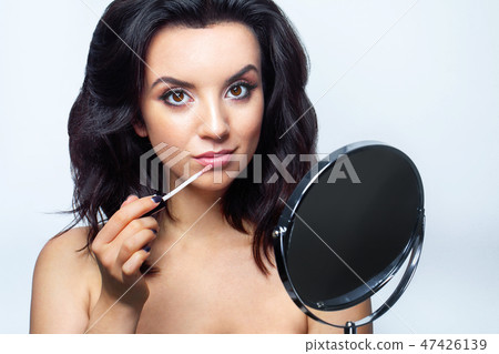 Makeup Beauty Face. Glamorous Female With Facial Cosmetics Makeup Beauty Face. Glamorous Female With Facial Cosmetics 47426139