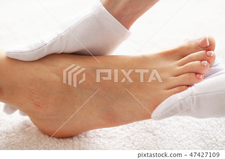 Pedicure Day. Pedicure Specialist Works With the Patient in Spa Salon 47427109