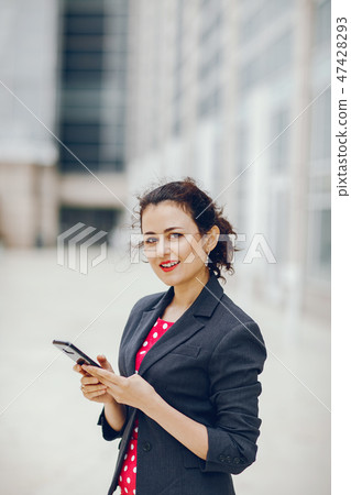 businesswoman in a summer city businesswoman in a summer city 47428293