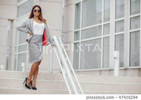 businesswoman in a summer city 47428294