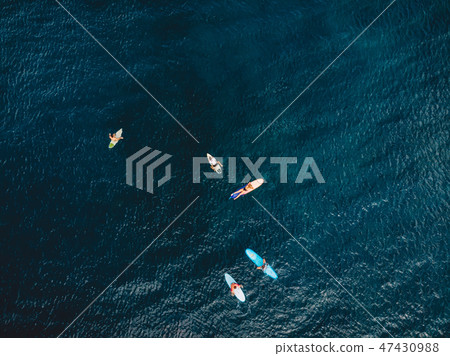 Aerial view of surfing. Surfers in ocean 47430988