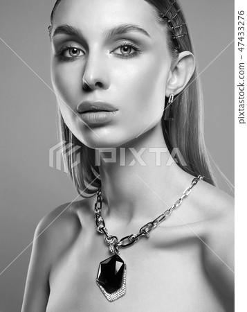 jewelry on beautiful girl. young blonde woman jewelry on beautiful girl. young blonde woman 47433276
