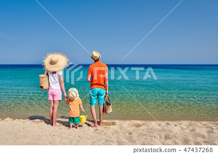 Family on beach in Greece 47437268