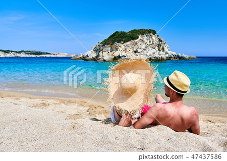 Couple on beach in Greece 47437586