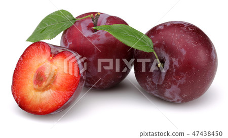 Red plums with leaves on white background 47438450