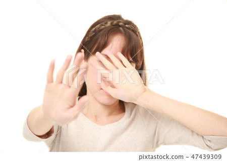 A woman refusing face appearance 47439309