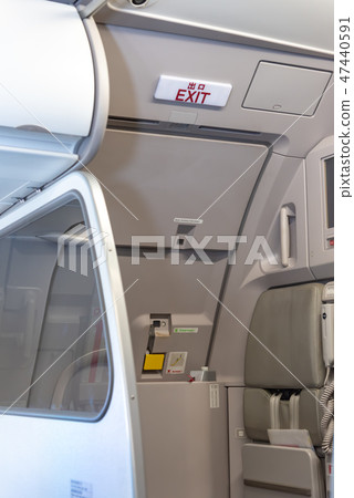Exit signs of airplanes How to survive Concept 47440591