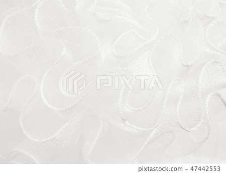 Closeup of white waved organza texture Closeup of white waved organza texture 47442553