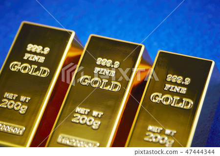 Gold sticks Blue background copy space Gold sticks Blue background copy space 47444344