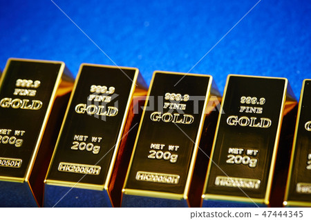 Gold sticks Blue background copy space Gold sticks Blue background copy space 47444345