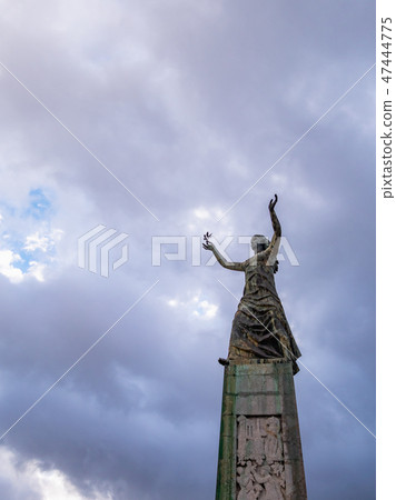 The statue of the goddess protecting the port of Palermo and the view of the bay stretching out into the Mediterranean Sea. The statue of the goddess protecting the port of Palermo and the view of the bay stretching out into the Mediterranean Sea. 47444775