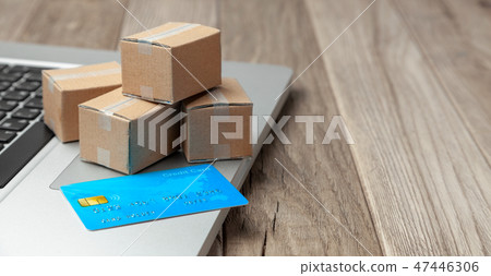 Delivery of the order from the online store. Shopping with payment online. Boxes with goods with Delivery of the order from the online store. Shopping with payment online. Boxes with goods with 47446306