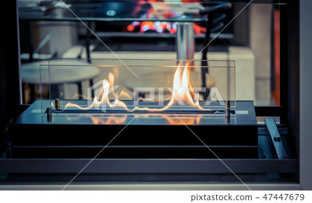 Modern bio fireplot on ethanol gas close-up Modern bio fireplot on ethanol gas close-up 47447679
