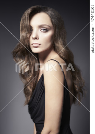 Fashion photo of beautiful lady in black dress. 47448105