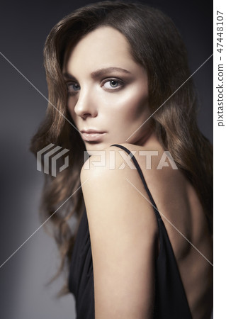Fashion photo of beautiful lady in black dress. 47448107