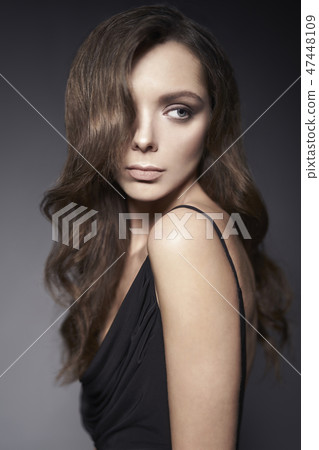 Fashion photo of beautiful lady in black dress. 47448109