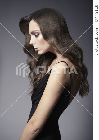 Fashion photo of beautiful lady in black dress. 47448119