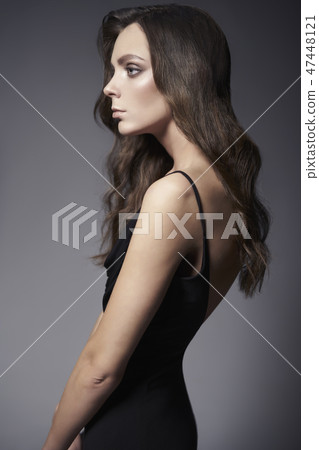 Fashion photo of beautiful lady in black dress. 47448121