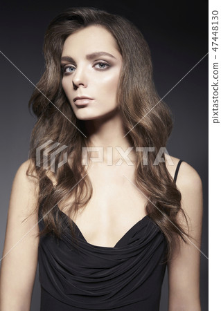 Fashion photo of beautiful lady in black dress. 47448130