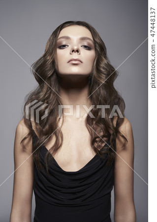 Fashion photo of beautiful lady in black dress. 47448137