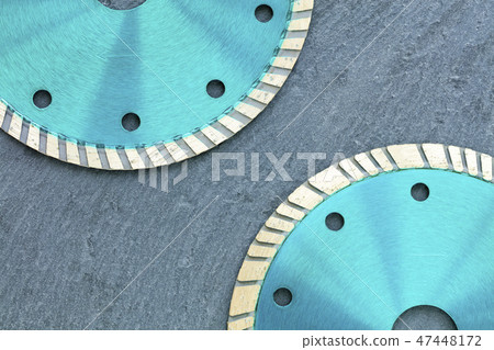 Part of the diamond cutting wheel of emerald color 47448172