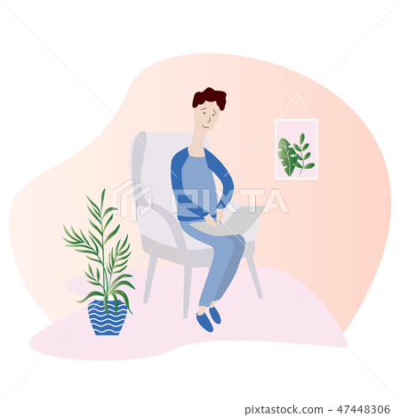 Young men with notebook and cat on chair at home.  47448306