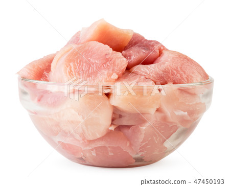 Chicken breast cut into pieces in a glass plate Chicken breast cut into pieces in a glass plate 47450193